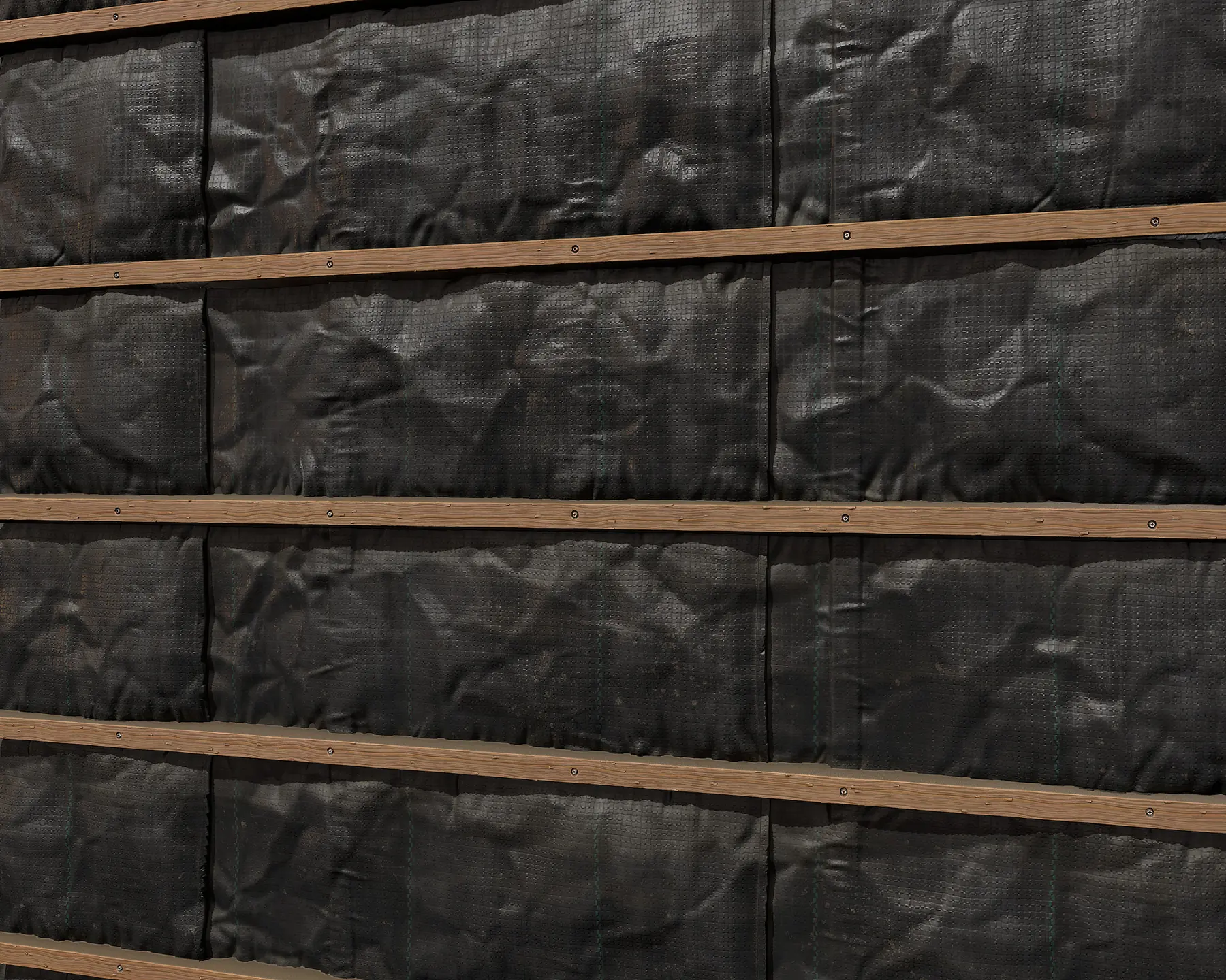 Tarp material showing woven fabric, folds and eyelets